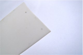 Laserborrning i keram, hål 11 µm 